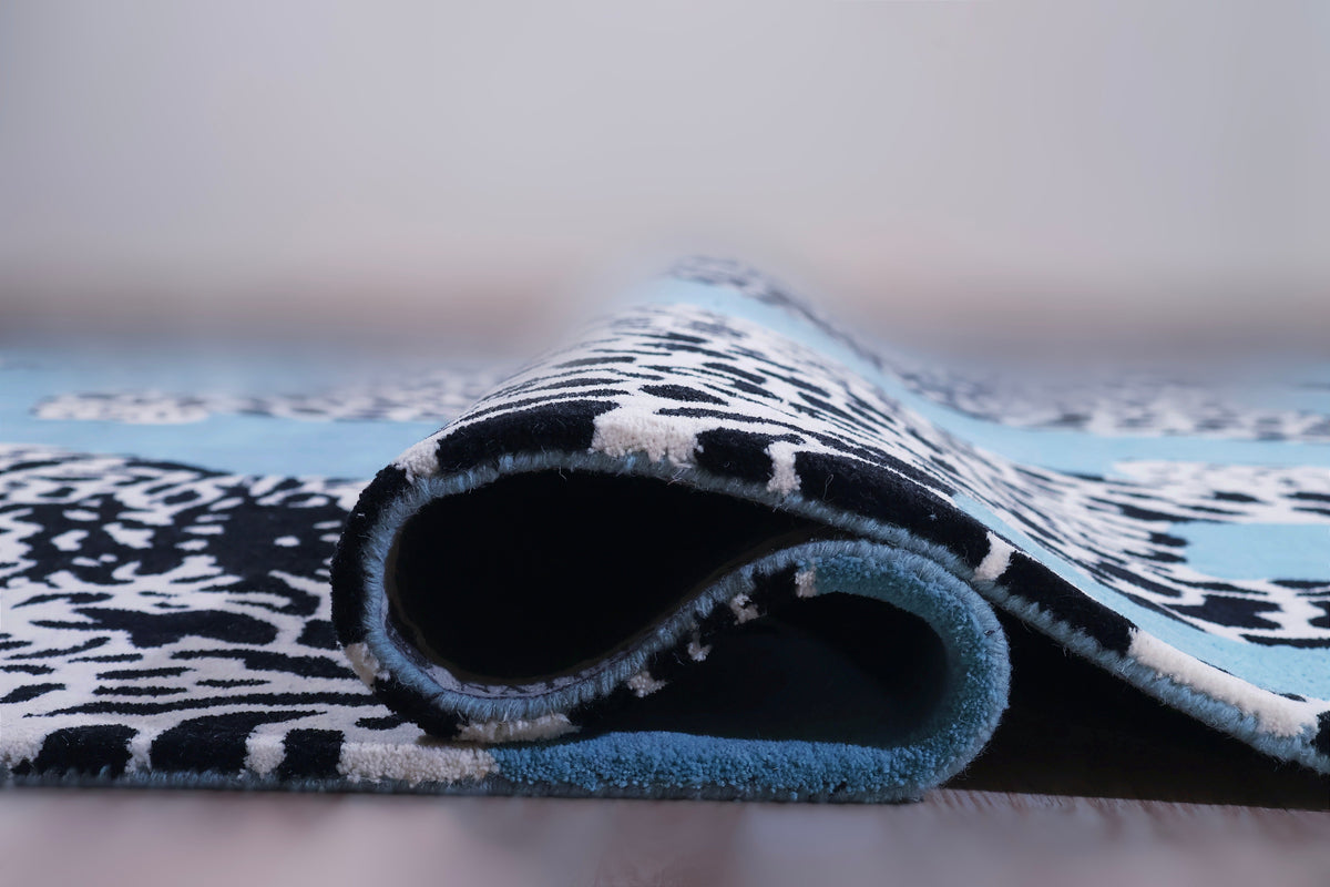 Climbing Jaguar Modern Handmade Wool Area Rug | Avyay Rugs