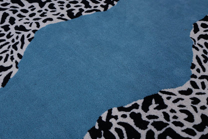 Climbing Jaguar Modern Handmade Wool Area Rug | Avyay Rugs